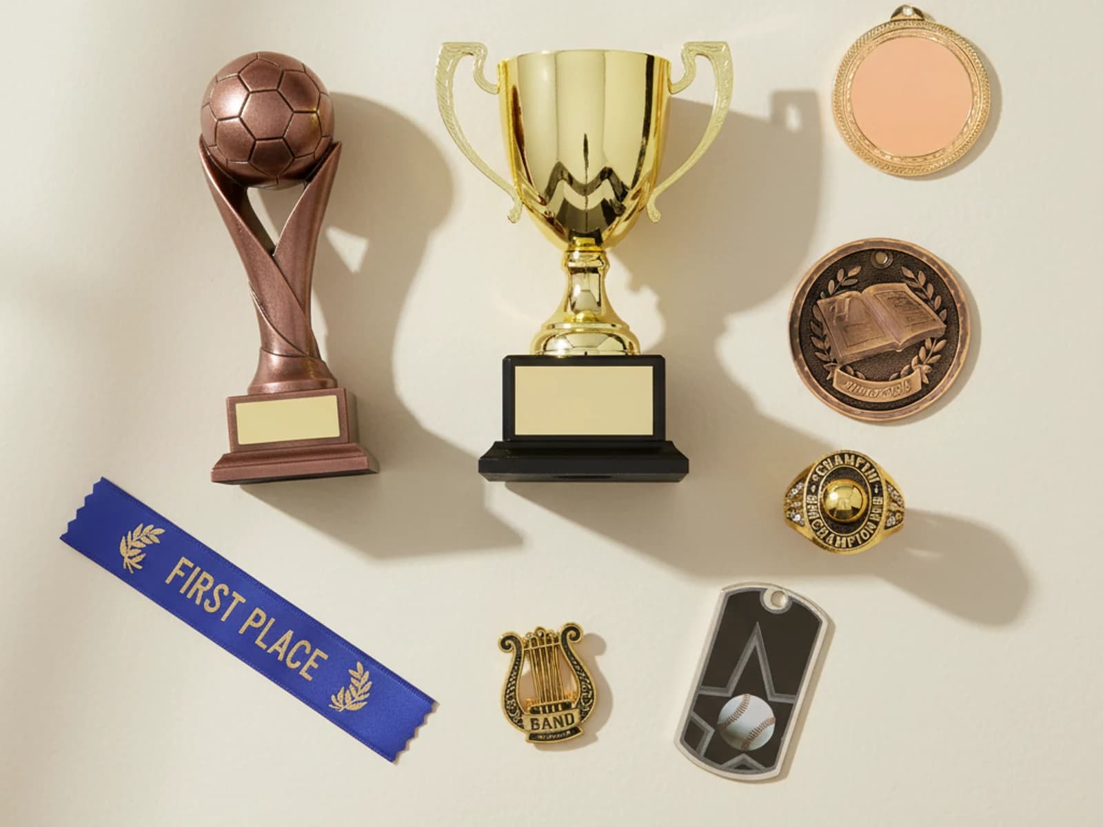 Sports & Academic Awards — Resin trophies, medals, ribbons, chenille, rings — for every sport and subject.